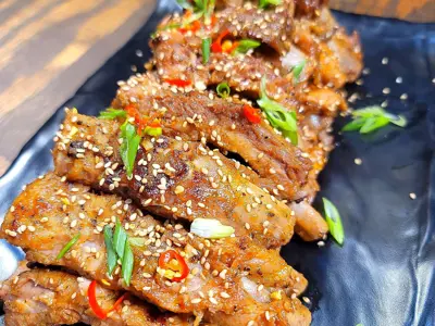 A plate of ribs in a restaurant  